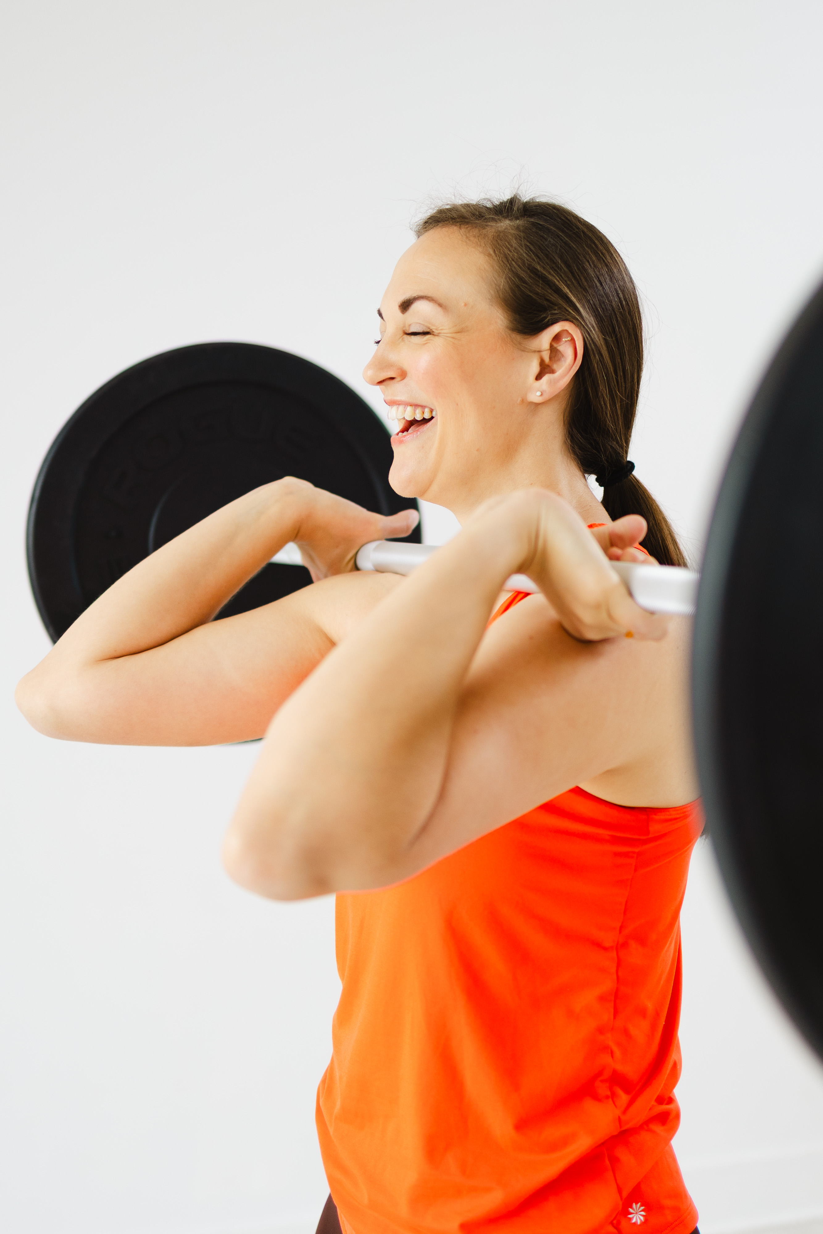 Woman doing strength training at PeakRx wellness center